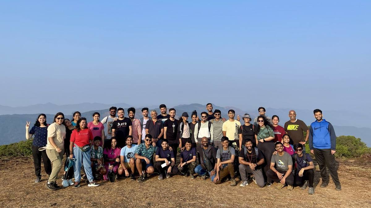 The whole SWYM team together on a hilltop during their offsite